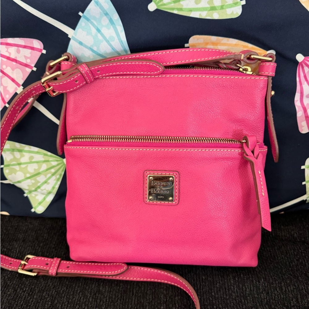 Small pink Dooney and Bourke crossbody